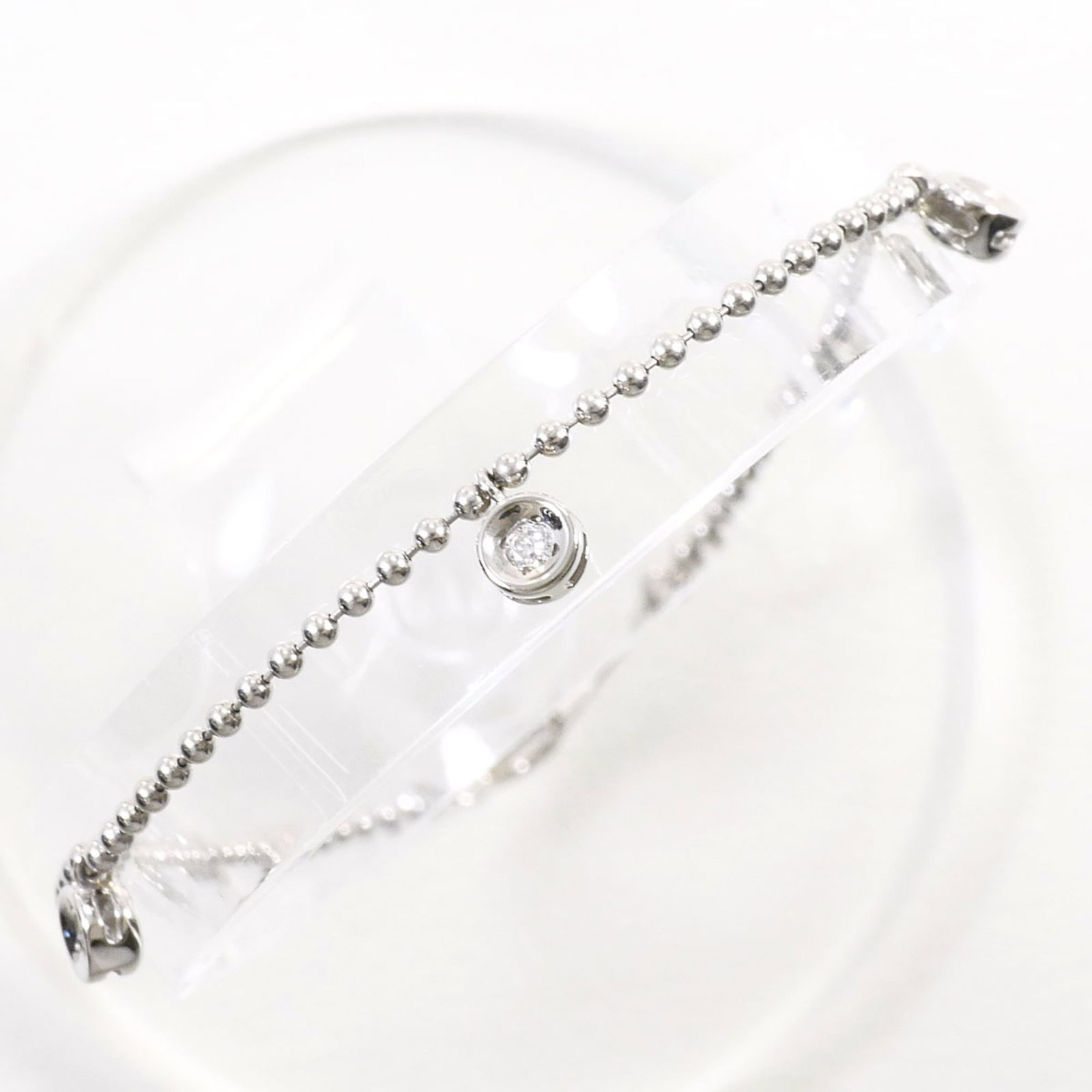 Unbranded Charm Bracelet Platinum 850: Unbranded Charm Bracelet Platinum 850 Platinum 850 charm bracelet with a diamond stone, weighing 0.13 carats, offers a touch of elegance and sophistication. Measuring 19cm in length, it features a