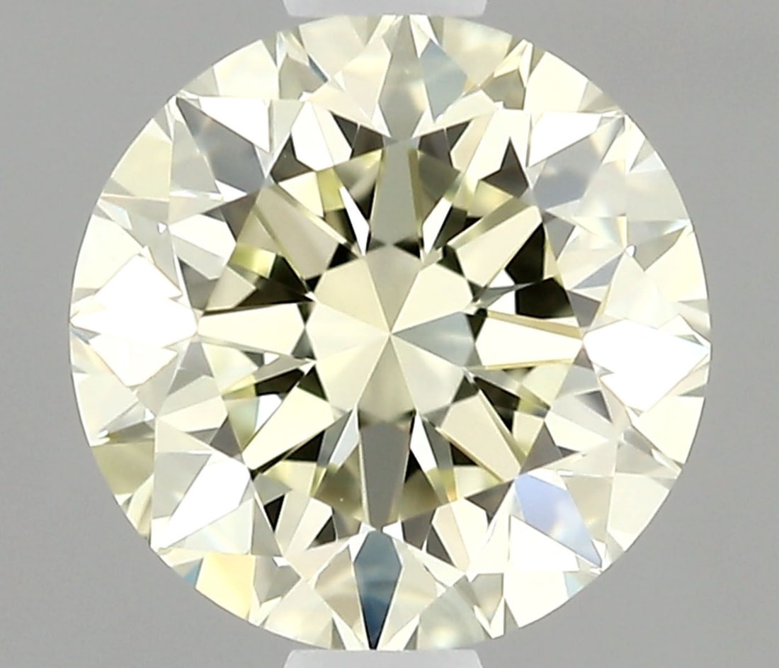 IGI Round 0.9ct M VVS1 - Loose Natural Diamond: IGI Round 0.9ct M VVS1 - Loose Natural Diamond 0.9ct M VVS1 - A Rare and Exceptional Natural Diamond. This IGI-certified, EX-cut diamond boasts an impressive clarity grade of VVS1 and a color grade of