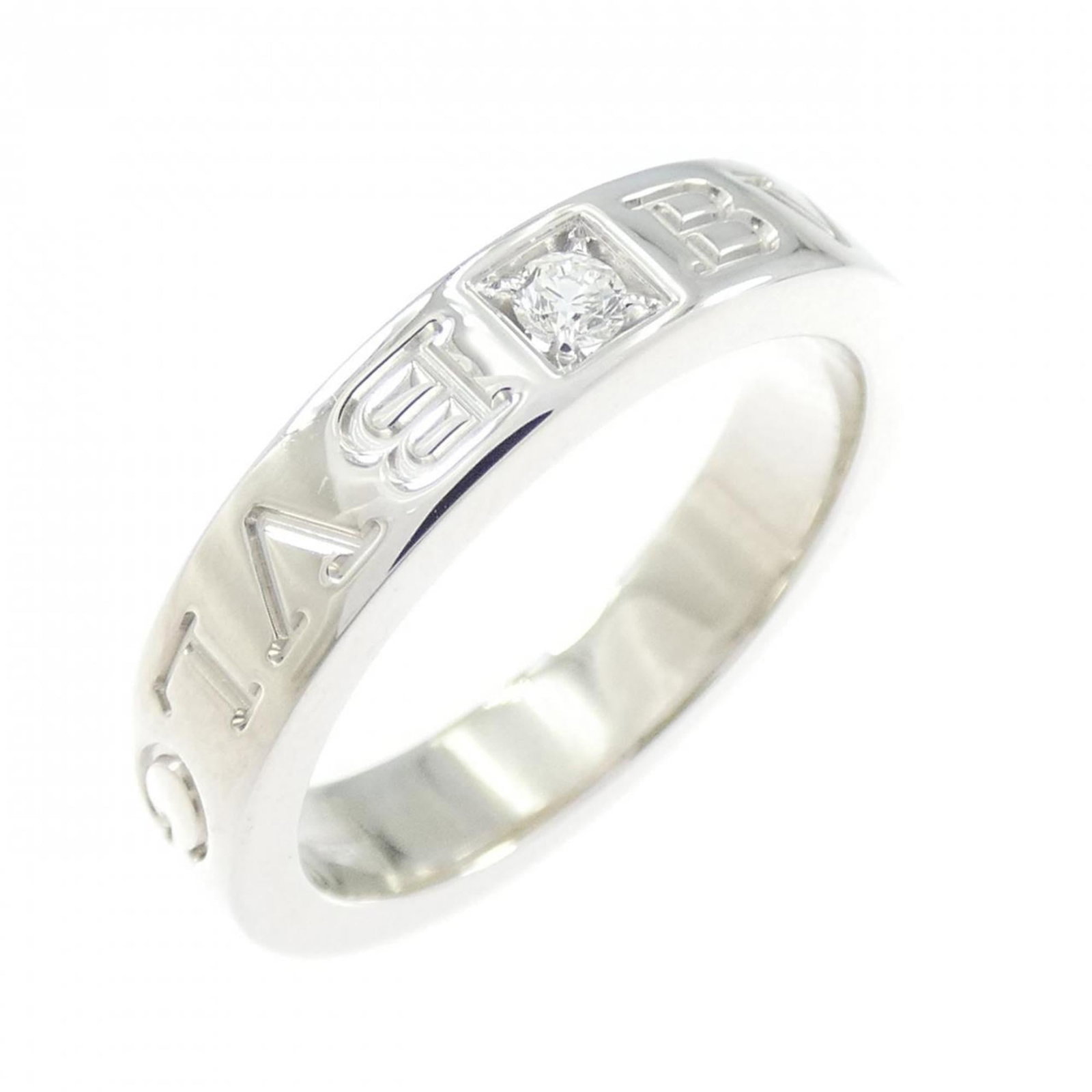 White Gold Bvlgari Ring Band: White Gold Bvlgari Ring Band White gold (18K) band ring with a diamond stone, available in US size 5. This Bvlgari MPN AN853348?339978 ring features white gold material and a striking diamond accent. 