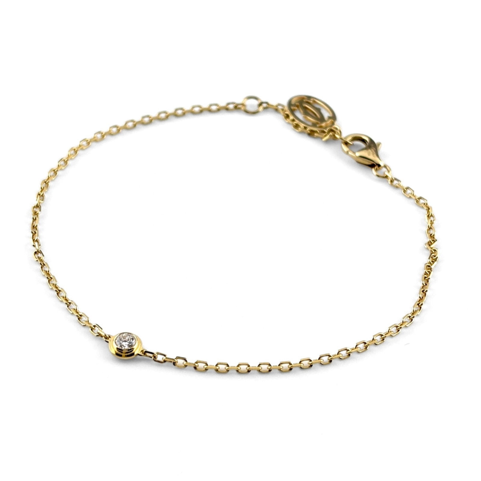 Charm Cartier Bracelet: Charm Cartier Bracelet 18K yellow gold Cartier charm bracelet with a diamond stone, featuring a classic design. The delicate chain measures 18cm in length and weighs approximately 2.1g. This elegant p