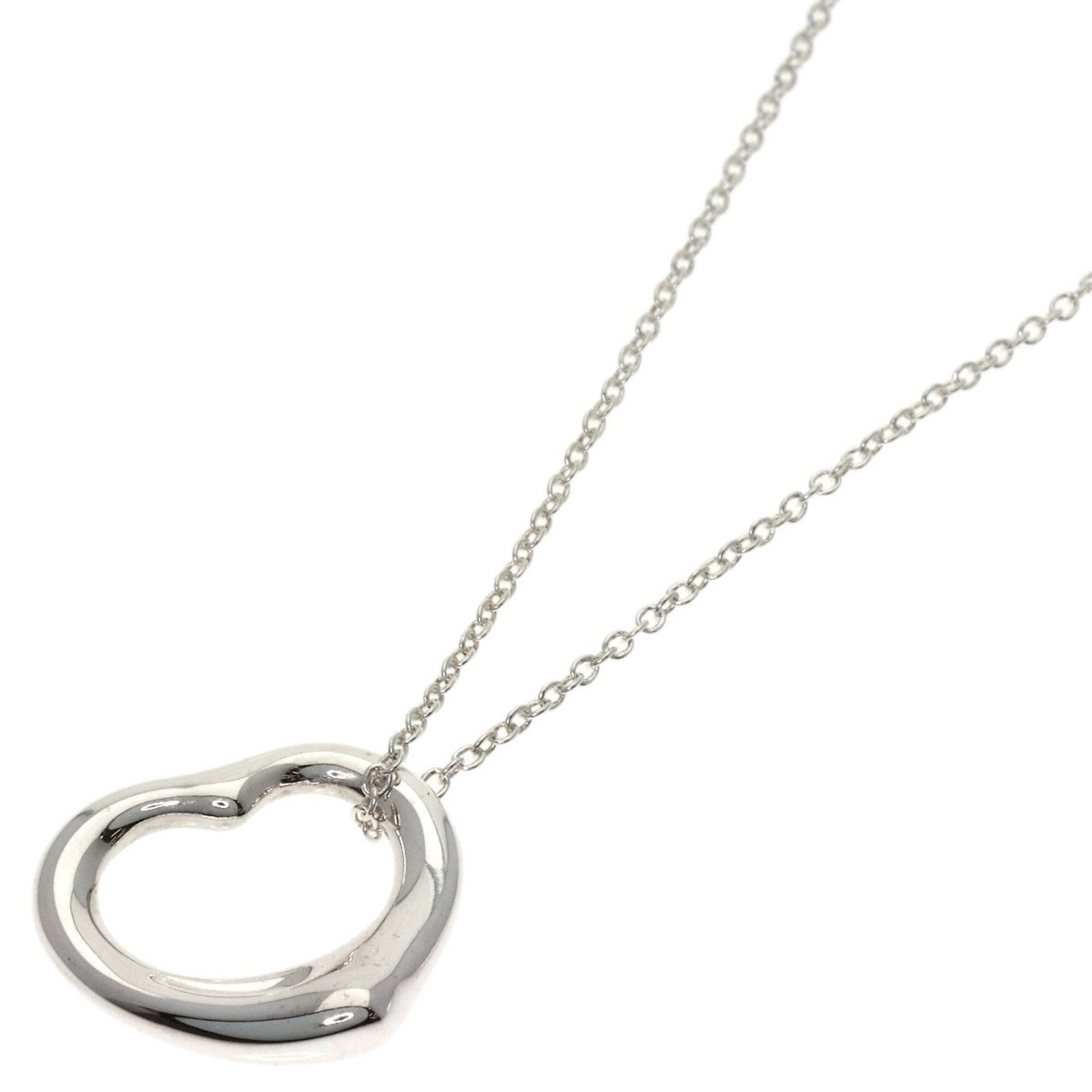 Tiffany & Co. Open Heart Necklace Silver Women'S: Tiffany & Co. Open Heart Necklace Silver Women'S Tiffany & Co. Open Heart Necklace in Silver, designed with an elegant open heart motif, adds a touch of sophistication to any outfit. The necklace