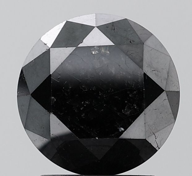Round 2.66ct Black VVS2 - Loose Natural Diamond: Round 2.66ct Black VVS2 - Loose Natural Diamond 2.66ct Black VVS2 - Loose Natural Diamond, showcasing exceptional clarity and luster in its EX cut and polish. With a rare black color and precise