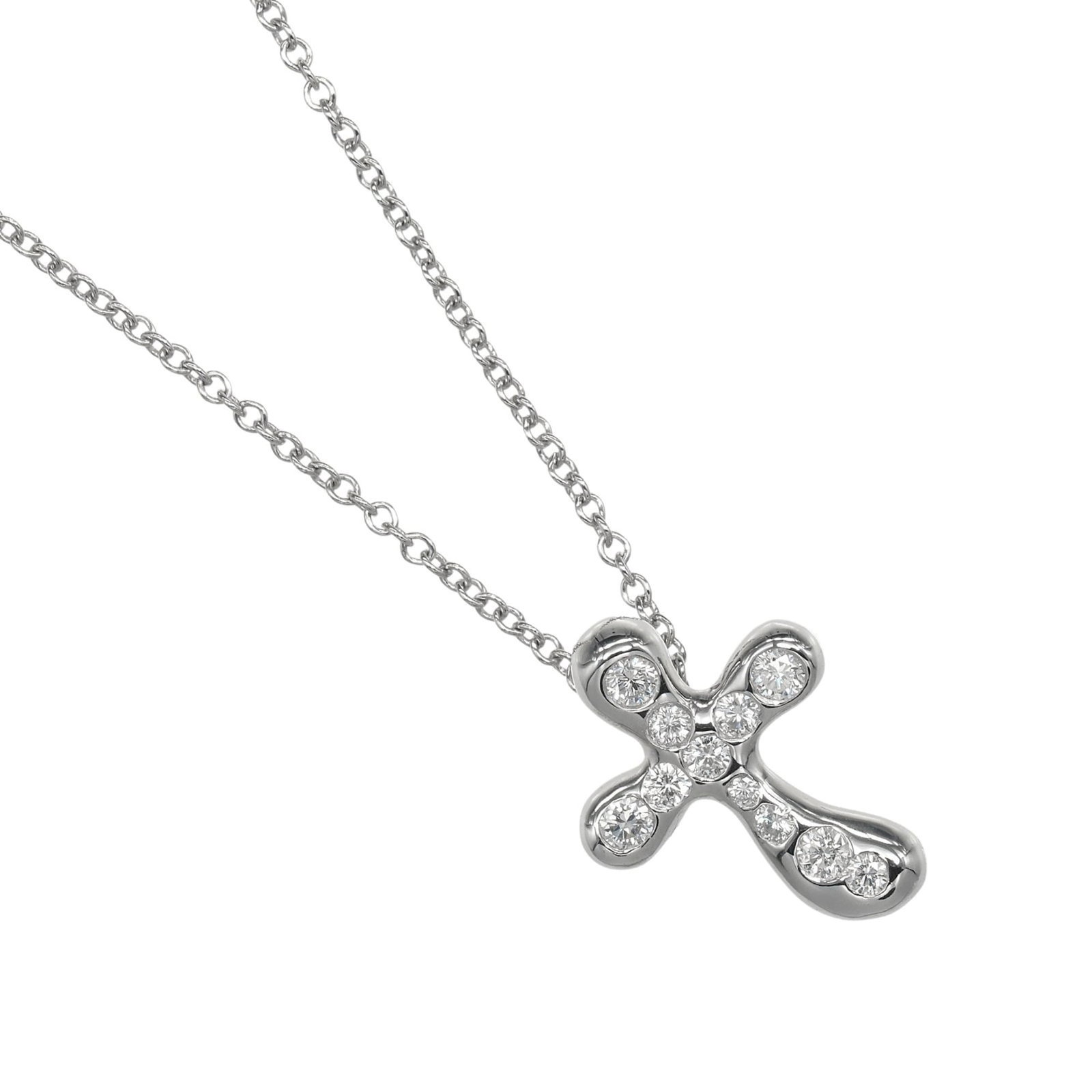 Tiffany & Co. Dots Cross Necklace In Pt950 Platinum With Diamonds Approx. 4.1G: Tiffany & Co. Dots Cross Necklace In Pt950 Platinum With Diamonds Approx. 4.1G Tiffany & Co.'s Dots Cross Necklace shines in platinum, adorned with diamonds weighing approximately 4.1 grams. This