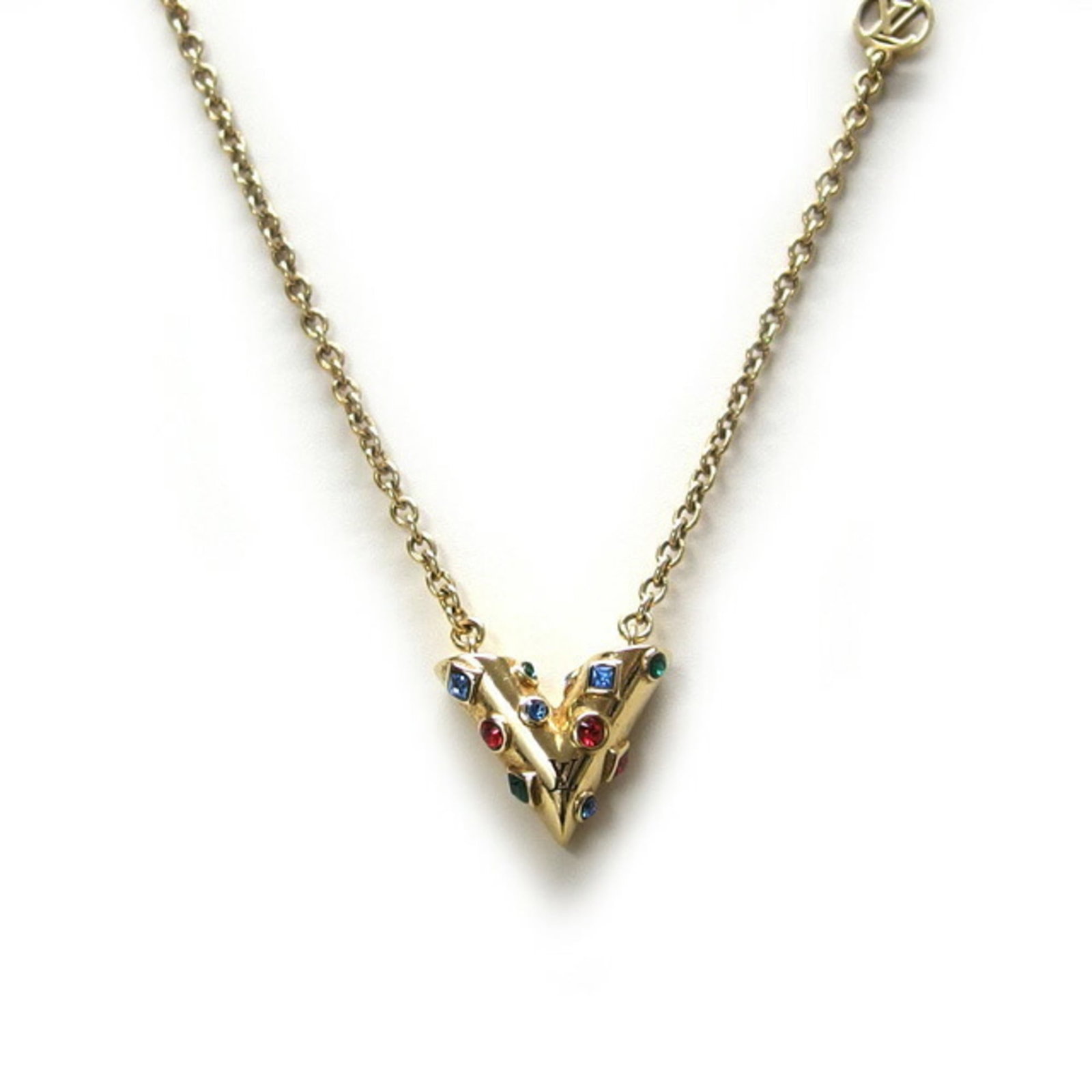 V Planet Essential Collier Gold Necklace Louis Vuitton: V Planet Essential Collier Gold Necklace Louis Vuitton The Louis Vuitton V Planet Essential Collier Gold Necklace boasts a sleek design with a gold pendant, measuring 12mm x 15mm. This elegant