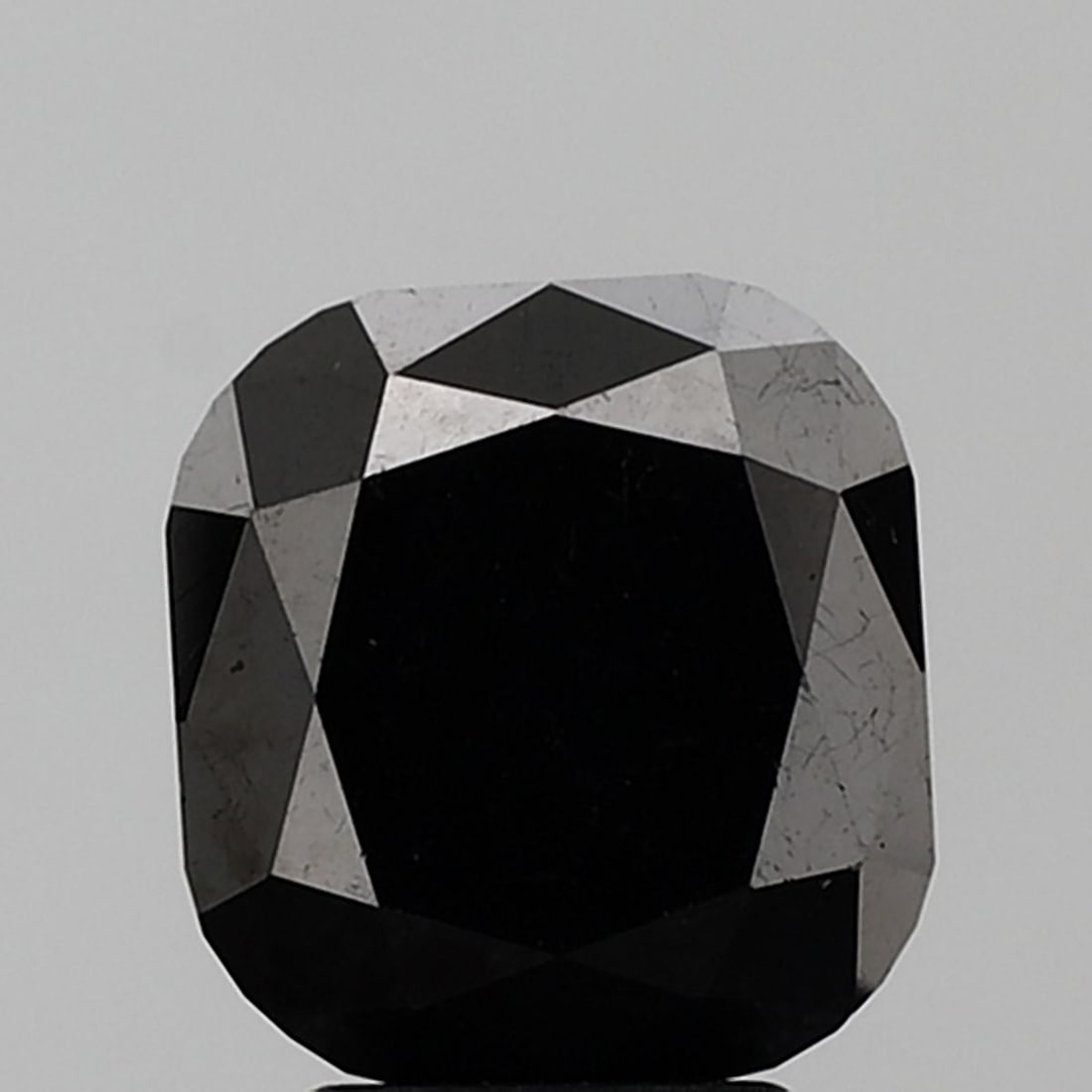 Cushion Brilliant 5.01ct Black VVS2 - Loose Natural Diamond: Cushion Brilliant 5.01ct Black VVS2 - Loose Natural Diamond 5.01ct Cushion Brilliant Black Diamond, certified VVS2 clarity and EX polish, boasts exceptional symmetry in its natural shape. This loose d