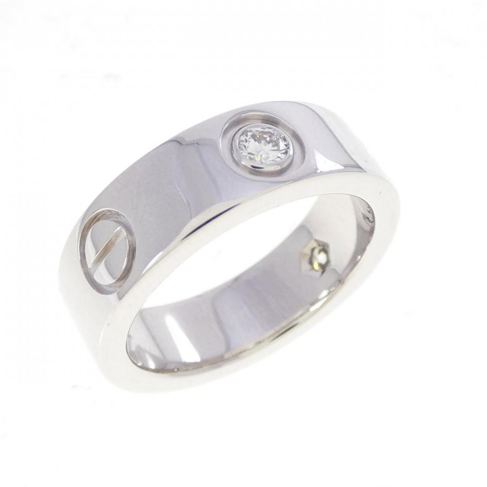Cartier Band Ring: Cartier Band Ring Cartier's iconic band ring boasts elegant lines and sophistication with its 18K white gold construction, featuring a stunning diamond stone. The ring's slender profile and delicate w
