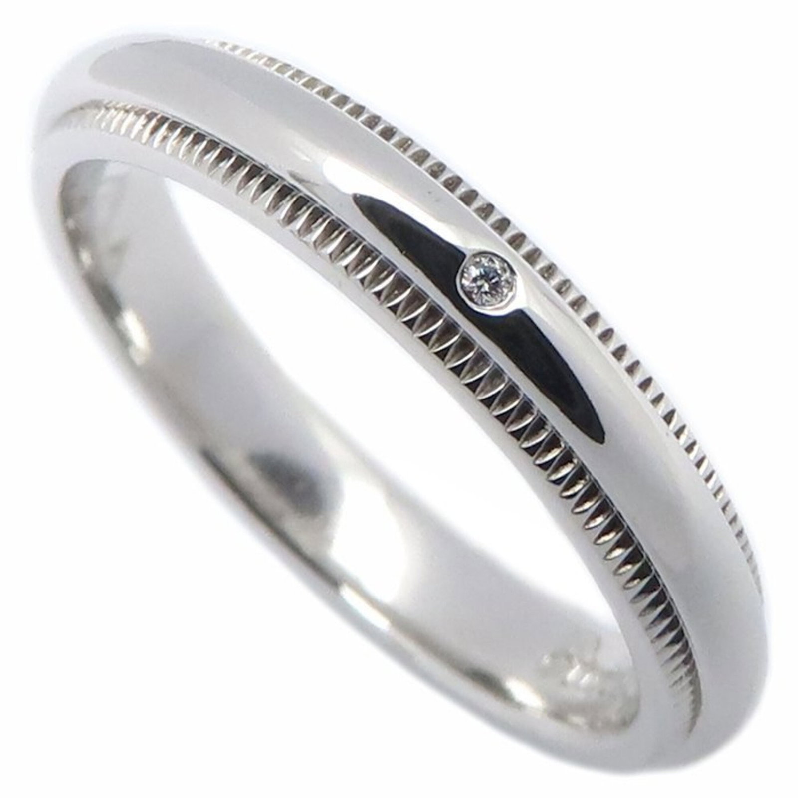 Tiffany Band Ring Platinum 950: Tiffany Band Ring Platinum 950 Tiffany's iconic band ring showcases its sleek design with platinum 950 material and a diamond stone, adding a touch of luxury to any outfit. The US size 5 fits comforta
