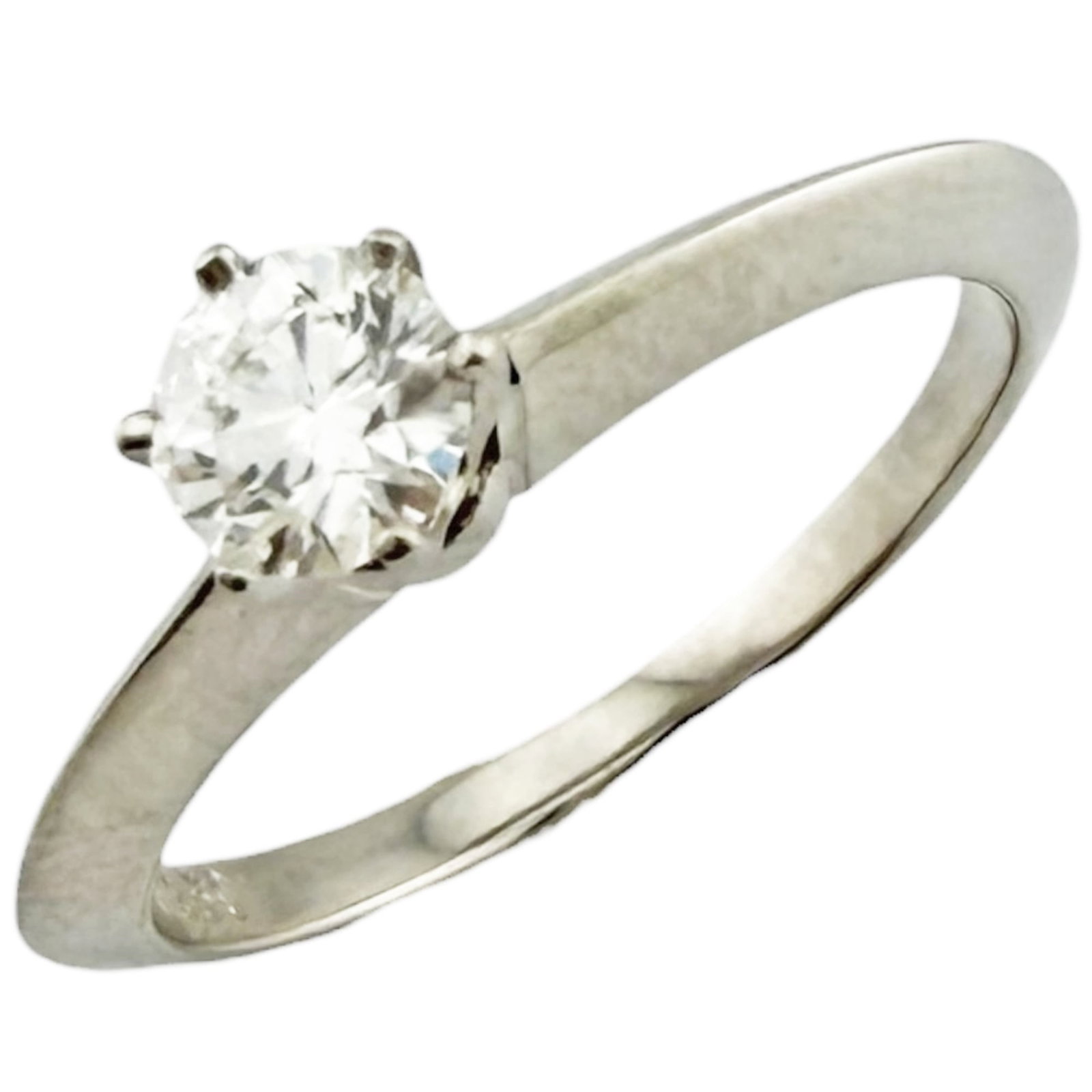 Tiffany Band Ring Platinum 950: Tiffany Band Ring Platinum 950 Platinum band ring from Tiffany featuring a diamond stone weighing 0.27 carats, crafted in platinum 950 and available in US size 4. Handmade with attention to detail, th