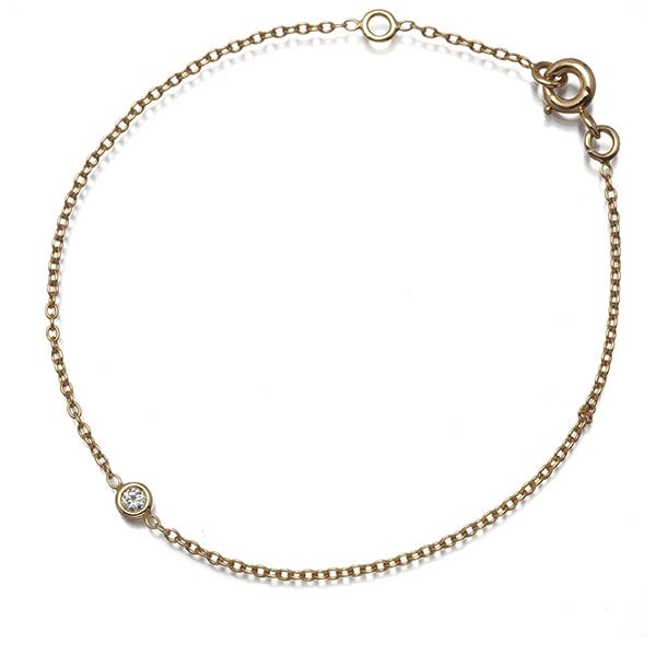 Diamond bracelet Mimioui in 18K yellow gold by Christian Dior: Diamond bracelet Mimioui in 18K yellow gold by Christian Dior 18K yellow gold Mimioui diamond bracelet by Christian Dior boasts an elegant design with a natural style and a delicate inner circumferenc
