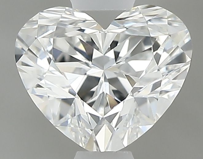 GIA Heart 0.6ct G VVS2 - Loose Natural Diamond: GIA Heart 0.6ct G VVS2 - Loose Natural Diamond GIA certified, this 0.6ct G VVS2 diamond boasts exceptional clarity and cut quality, with an EX polish and symmetry that enhance its natural beauty. Meas