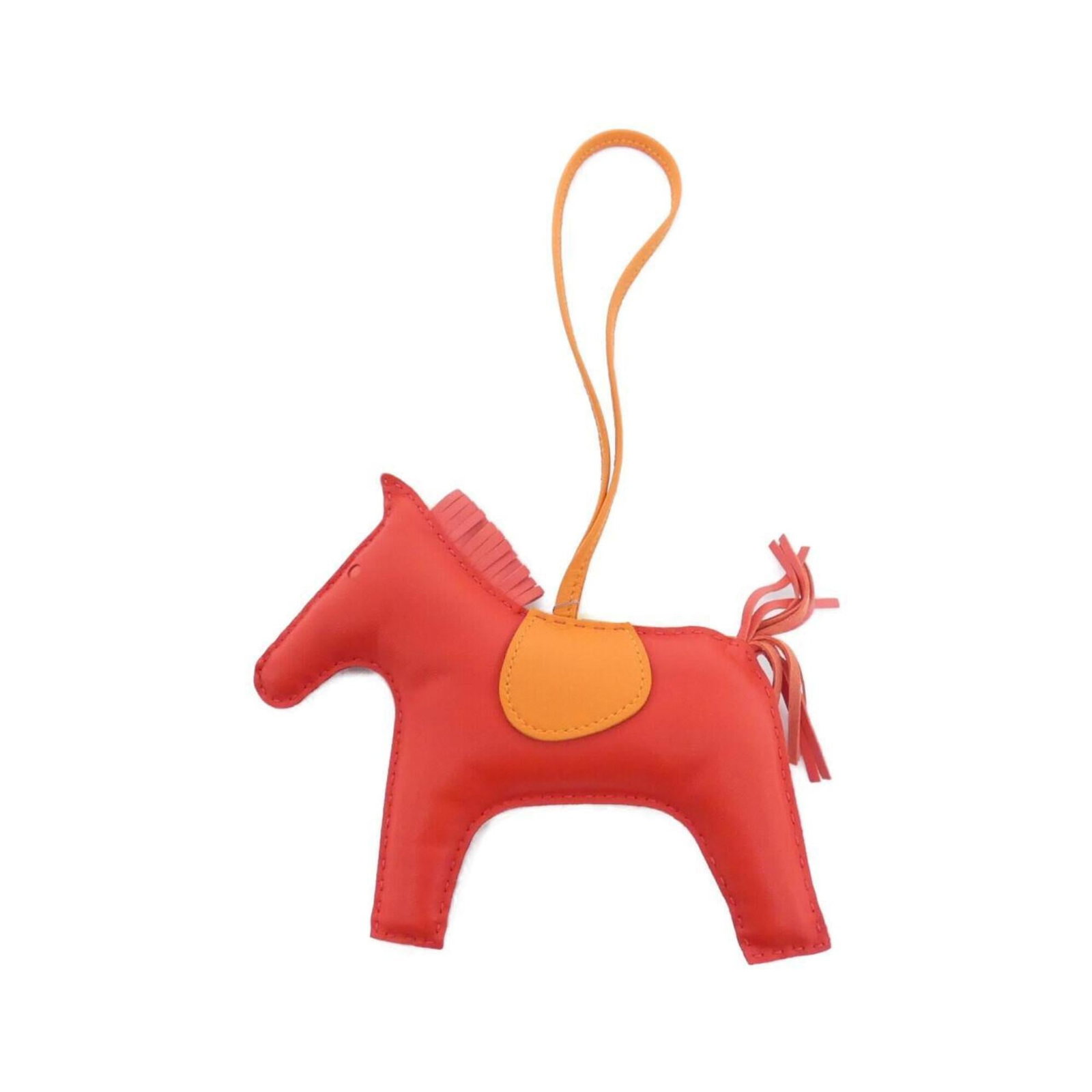 Hermes Charm Handbag Agneau Milo: Hermes Charm Handbag Agneau Milo Agneau Milo, the signature Herm?s material used in this charming handbag. The vibrant red color and rose jaipur details add a touch of elegance to this compact design.