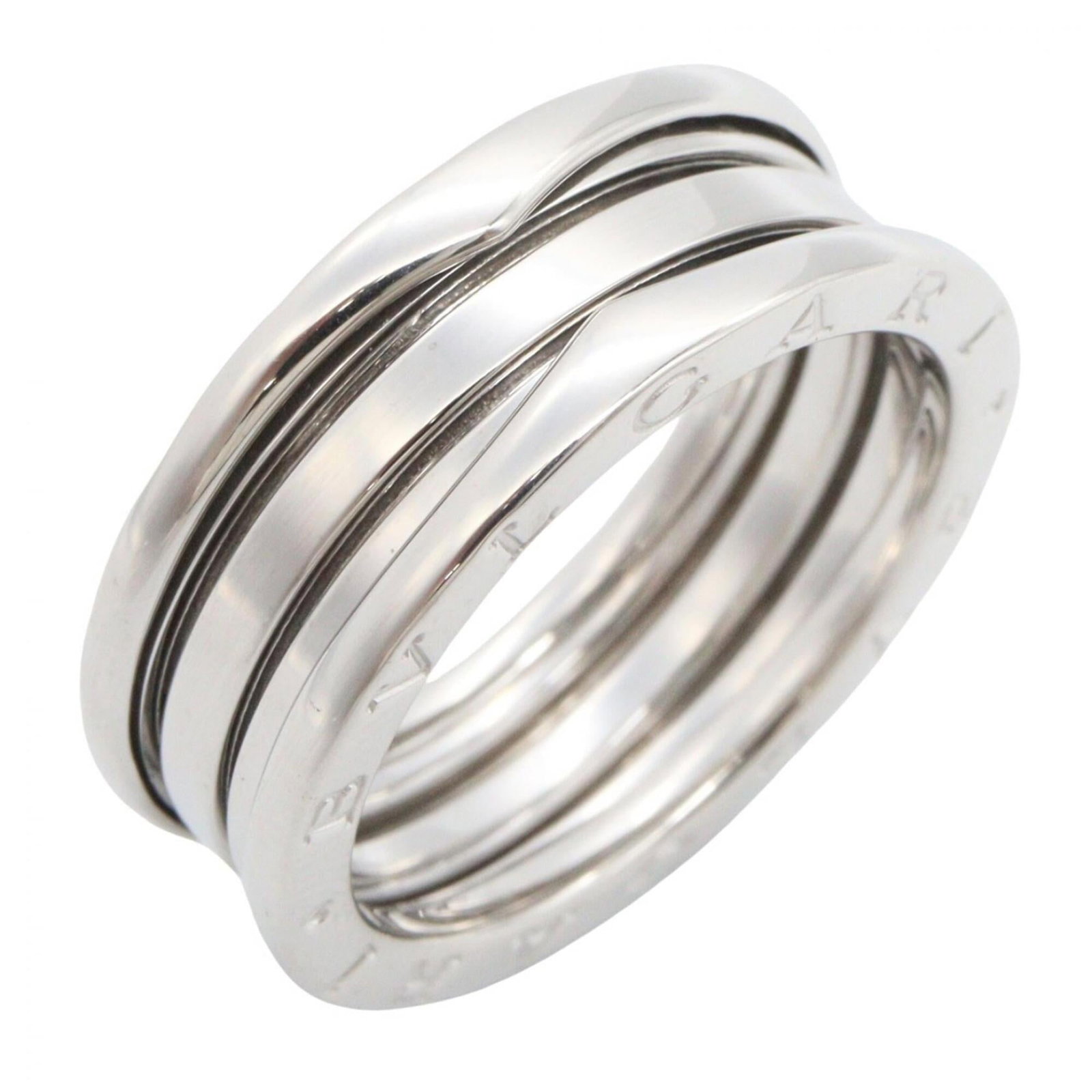 White Gold Bvlgari Ring Band: White Gold Bvlgari Ring Band White gold (18K) construction provides durability and elegance to this Bvlgari band ring, available in US size 10. The silver color offers a sleek and modern look that sui