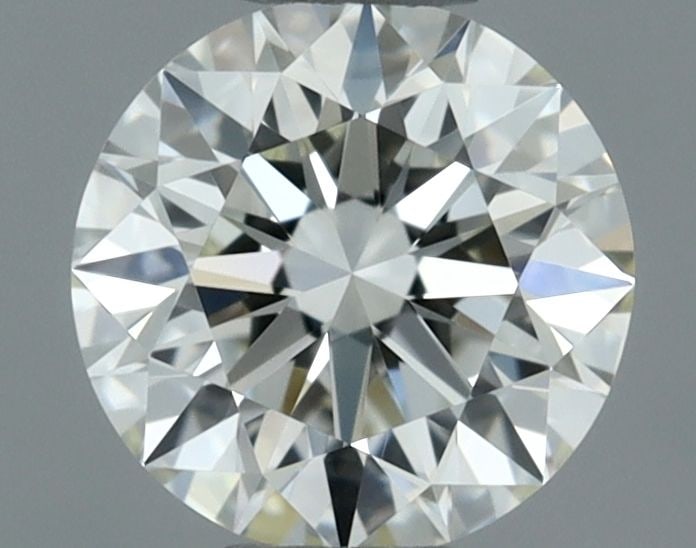 GIA Round 0.4ct K VVS1 - Loose Natural Diamond: GIA Round 0.4ct K VVS1 - Loose Natural Diamond A stunning GIA-certified round diamond, weighing 0.4 carats and boasting exceptional clarity with a VVS1 grade, sits within your hands. Its K color and
