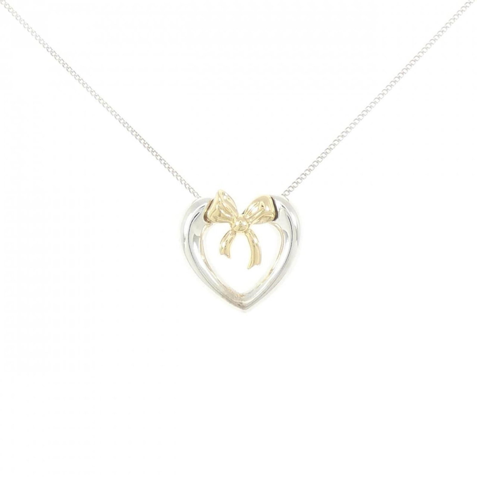 Tiffany & Co. 925 750Yg Necklace: Tiffany & Co. 925 750Yg Necklace Tiffany & Co. 925 750Yg Necklace features a pendant made from silver 925 and yellow gold (18K), measuring 17.3mm x 18.1mm. The necklace has a neck circumference of 46