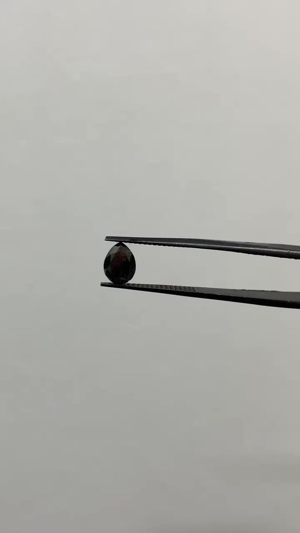 GIA Pear 0.97ct Fancy Black VVS2 - Loose Natural Diamond: GIA Pear 0.97ct Fancy Black VVS2 - Loose Natural Diamond GIA-certified Fancy Black diamond, measuring 0.97 carats, boasts exceptional clarity and polish with VVS2 and EX symmetries. Its natural