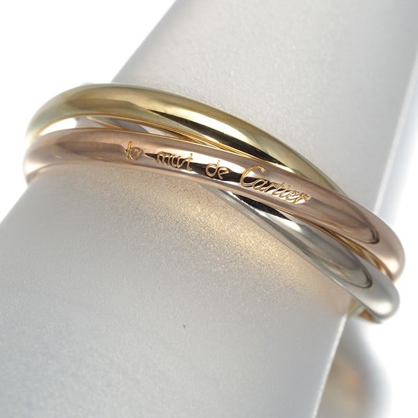 Cartier Ring Trinity 3Color Xs Eu55 18K 750 Yellow White Rose Gold: Cartier Ring Trinity 3Color Xs Eu55 18K 750 Yellow White Rose Gold Cartier's iconic Trinity ring boasts a striking three-tone design, expertly combining 18k yellow, white, and rose gold in a harmoniou