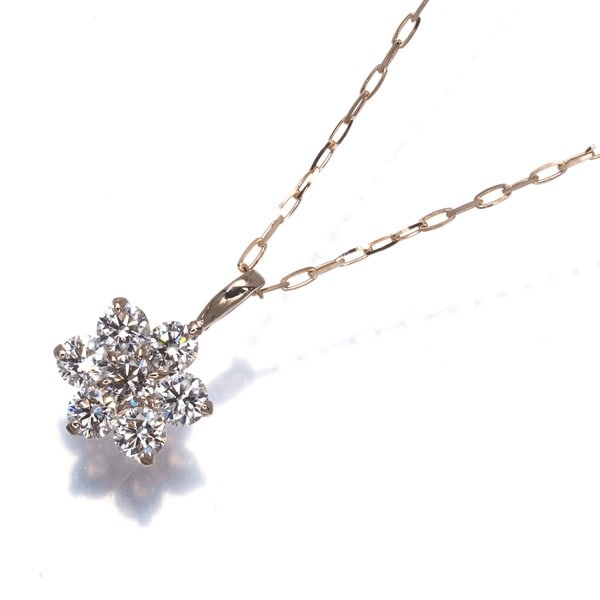 Diamond 0.30Ct Flower Necklace 18K 750 Rose Gold: Diamond 0.30Ct Flower Necklace 18K 750 Rose Gold This exquisite rose gold flower necklace showcases a delicate 0.30ct diamond pendant, carefully crafted to add a touch of elegance to any outfit. The a