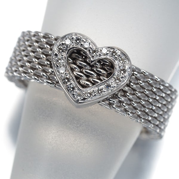 Tiffany&Co. Ring Diamond Somerset Mesh Heart 18K Wg: Tiffany&Co. Ring Diamond Somerset Mesh Heart 18K Wg Tiffany & Co.'s 18k white gold ring showcases a stunning diamond set in a Somerset mesh heart design. The natural diamond, unmarked for its carat we