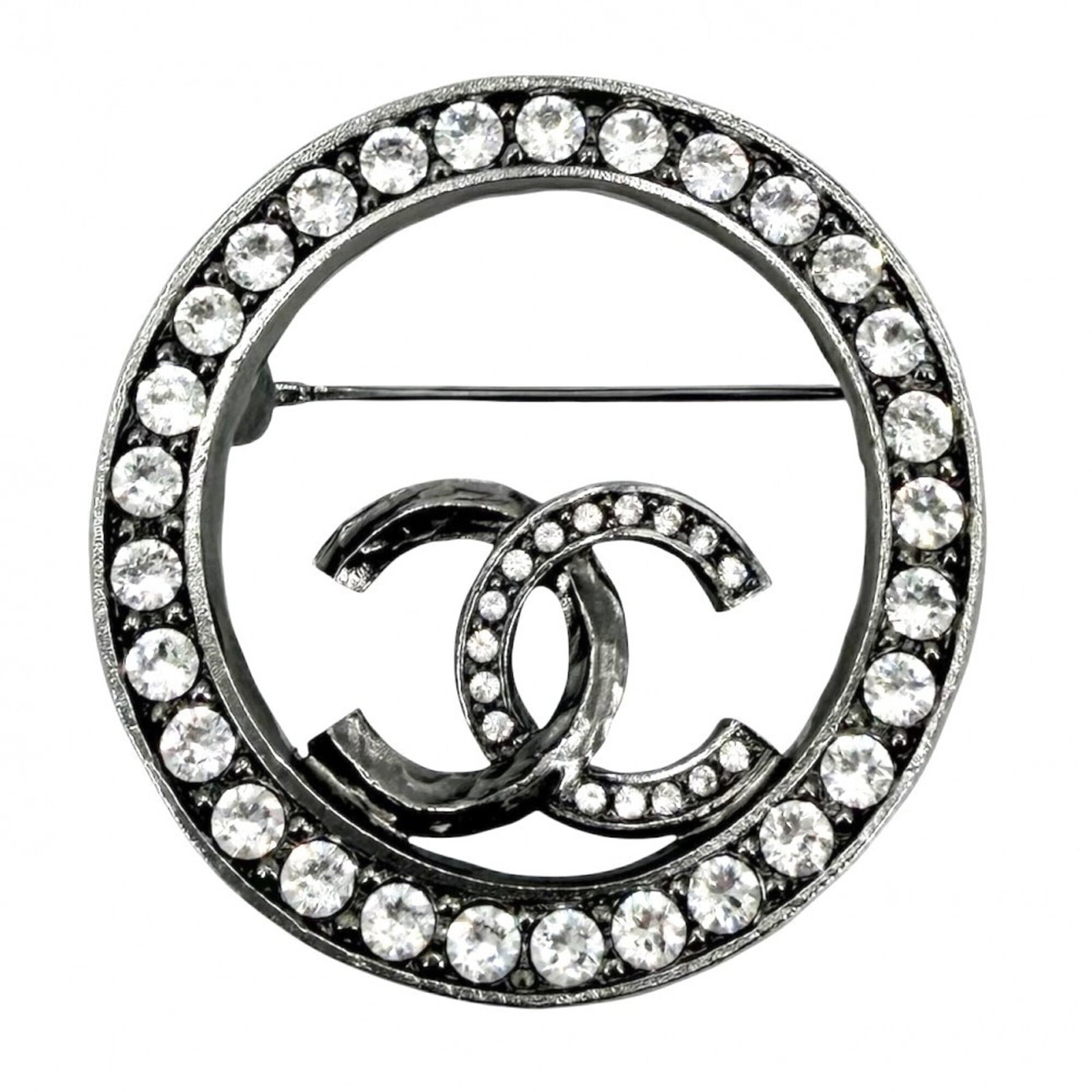 Rhinestone Brooch by Chanel: Rhinestone Brooch by Chanel Rhinestone Brooch by Chanel, featuring intricate rhinestones in a compact design, measures 3.8cm x 3.8cm x 5.00mm. This small yet striking brooch showcases the brand's atte