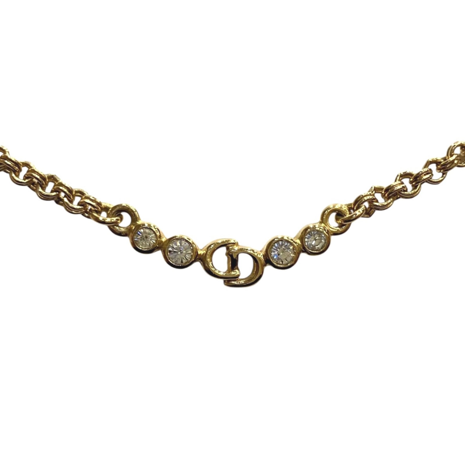 Christian Dior Necklace 43cm with gold plated rhinestones.: Christian Dior Necklace 43cm with gold plated rhinestones. Gold plated rhinestones adorn the Christian Dior necklace, adding a touch of luxury to its 43cm length. The pendant measures 6mm x 9mm and be