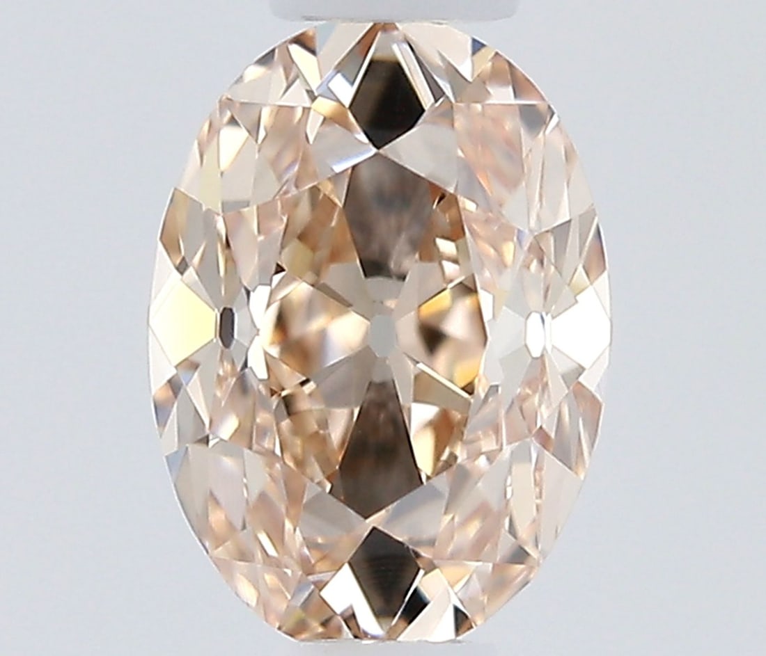 GIA Oval 0.4ct Fancy Pink Brown VVS1 - Loose Natural Diamond: GIA Oval 0.4ct Fancy Pink Brown VVS1 - Loose Natural Diamond GIA certifies this oval-cut, 0.4-carat Fancy Pink Brown diamond with exceptional clarity and polish, boasting a VVS1 grade and EX polish.