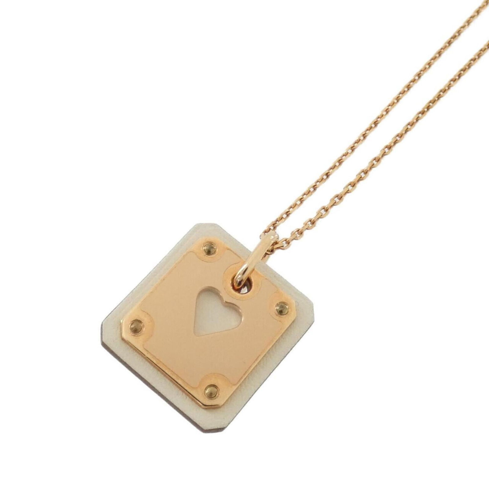 Hermes Az De Coeur Necklace: Hermes Az De Coeur Necklace Swift leather and rose gold come together in the elegant Az De Coeur Necklace, featuring a 22mm x 20mm pendant that adds a touch of sophistication to any outfit. With a