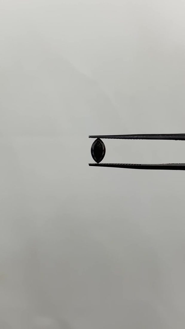 GIA Marquise 0.63ct Fancy Black VVS2 - Loose Natural Diamond: GIA Marquise 0.63ct Fancy Black VVS2 - Loose Natural Diamond GIA Marquise cut diamond with exceptional clarity and polish, boasting a Fancy Black color grade and VVS2 clarity. Measuring 7.56L x 4.32W 