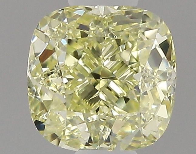 GIA Cushion Brilliant 0.47ct Fancy Yellow VVS2 - Loose Natural Diamond: GIA Cushion Brilliant 0.47ct Fancy Yellow VVS2 - Loose Natural Diamond GIA certified, this loose natural diamond boasts an impressive Fancy Yellow color and exceptional clarity, graded VVS2. Measuring