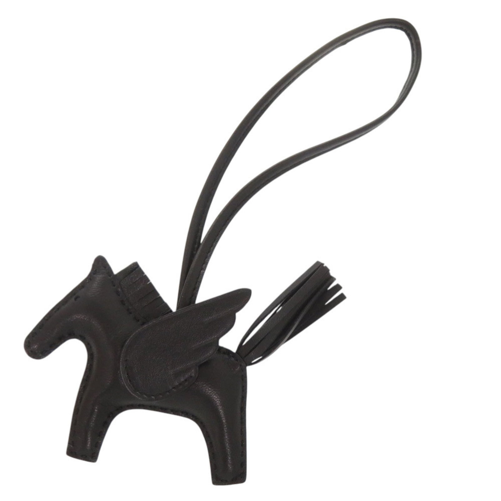 Hermes Charm Handbag Agneau Milo: Hermes Charm Handbag Agneau Milo Agneau Milo, a signature material from Hermes, gives this charm handbag its distinctive look and feel. Measuring just 7.50mm x 9.00mm, it's a compact yet elegant acces