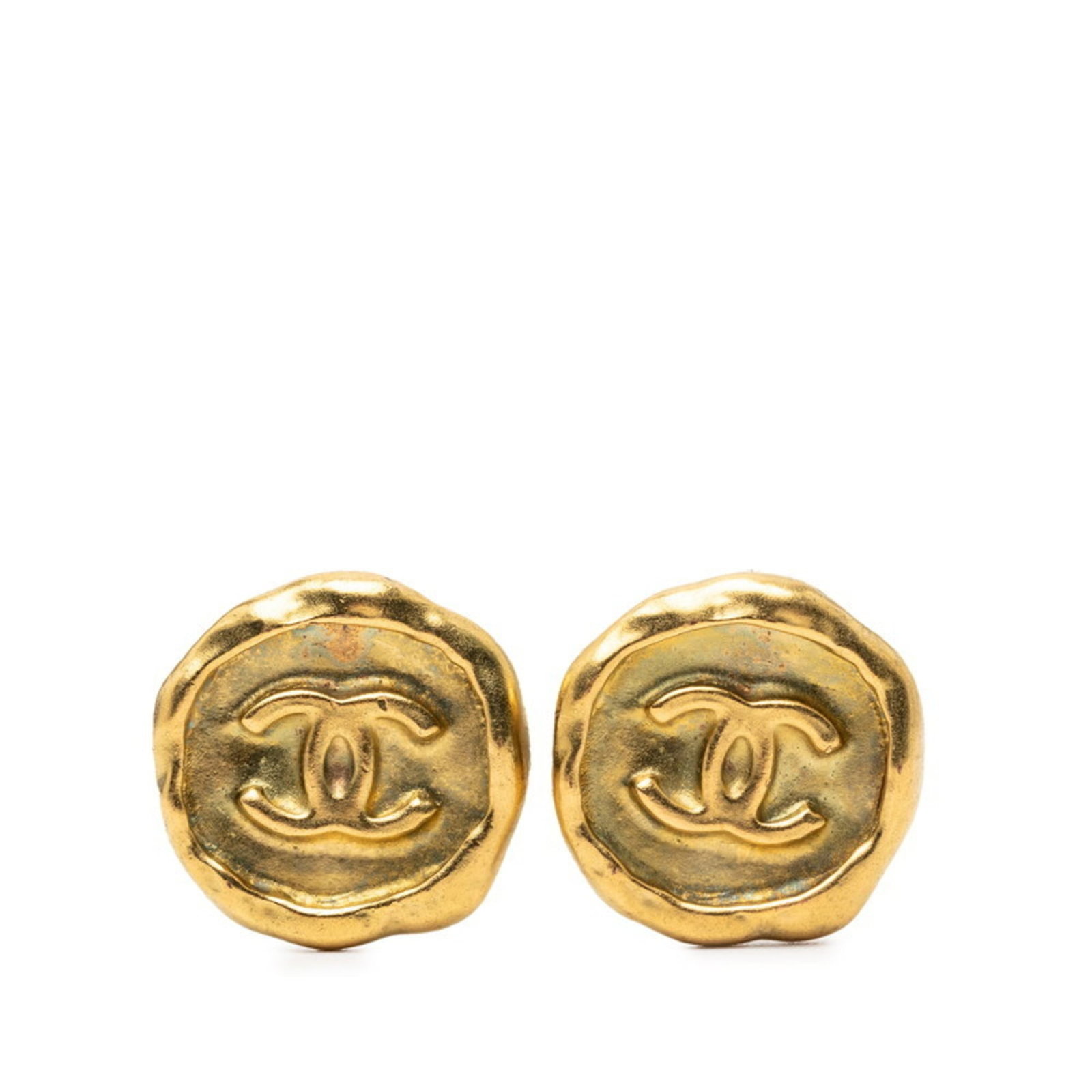 Chanel Clip Earrings Gold Plating: Chanel Clip Earrings Gold Plating Gold plating details add a touch of luxury to these sleek clip earrings, designed by the renowned French fashion house Chanel. Made from gold plating material, they
