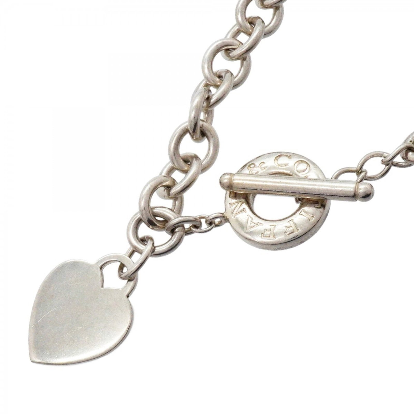 Sterling silver women's necklace with toggle and heart tag from Tiffany & Co.: Sterling silver women's necklace with toggle and heart tag from Tiffany & Co. Sterling silver women's necklace with toggle and heart tag from Tiffany & Co. features a pendant measuring 33.2mm x
