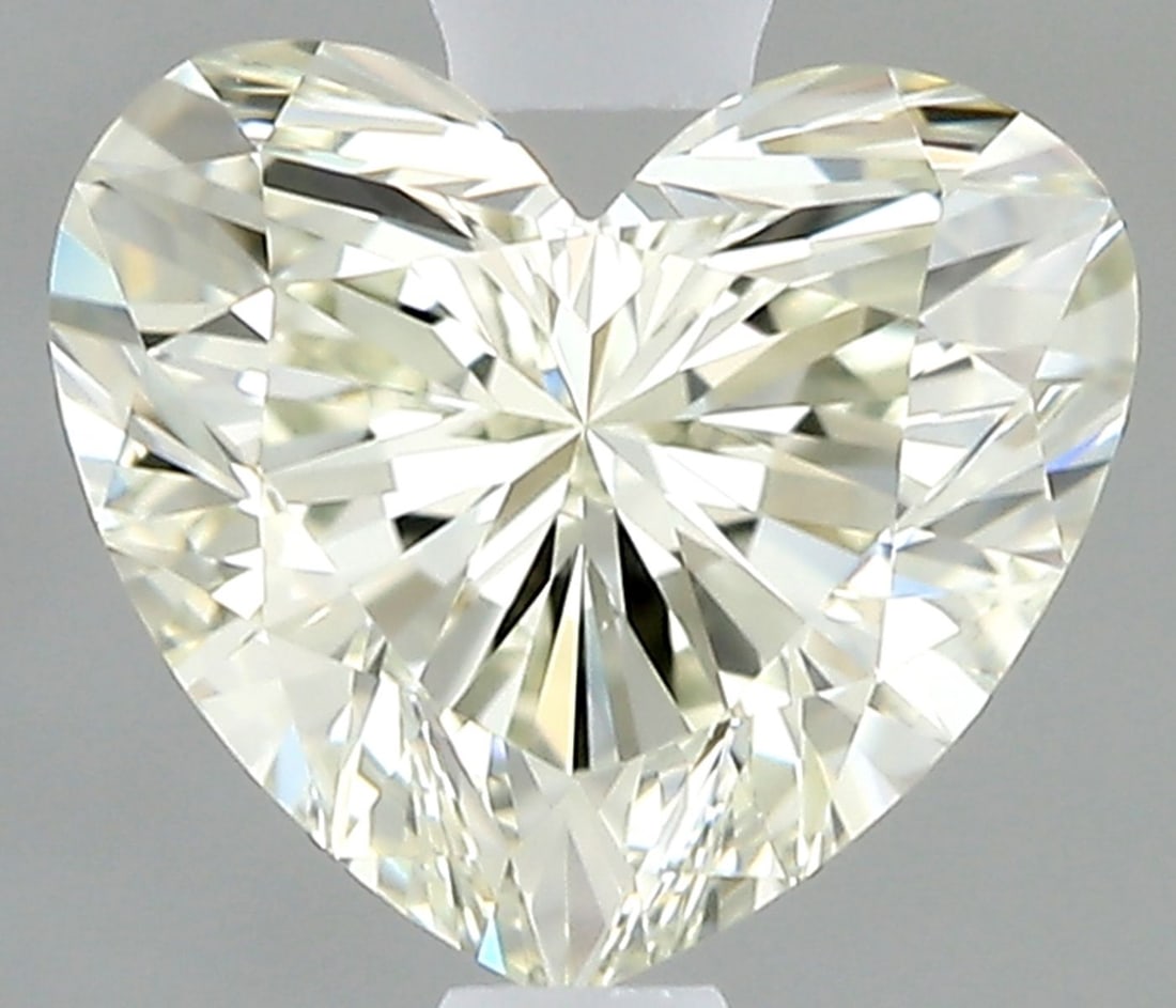 IGI Heart 0.57ct J VVS2 - Loose Natural Diamond: IGI Heart 0.57ct J VVS2 - Loose Natural Diamond 0.57ct IGI VVS2 J Diamond - Natural BeautyThe IGI Heart 0.57ct J VVS2 diamond boasts exceptional clarity and color, with a high level of polish and symm