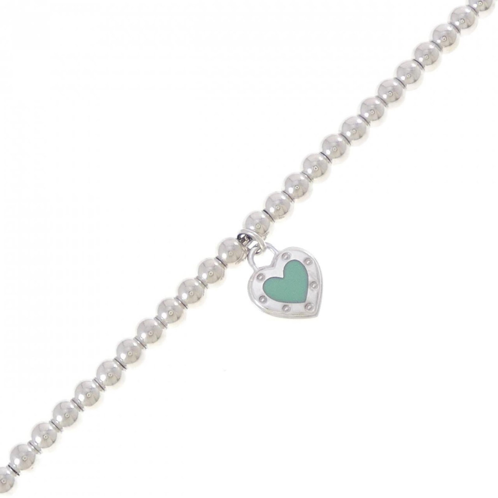 Tiffany Charm Bracelet Silver 925: Tiffany Charm Bracelet Silver 925 Silver 925 Tiffany Charm Bracelet, measuring 19cm in length. This charm bracelet features the iconic Tiffany brand and is made from high-quality silver. Its sleek des