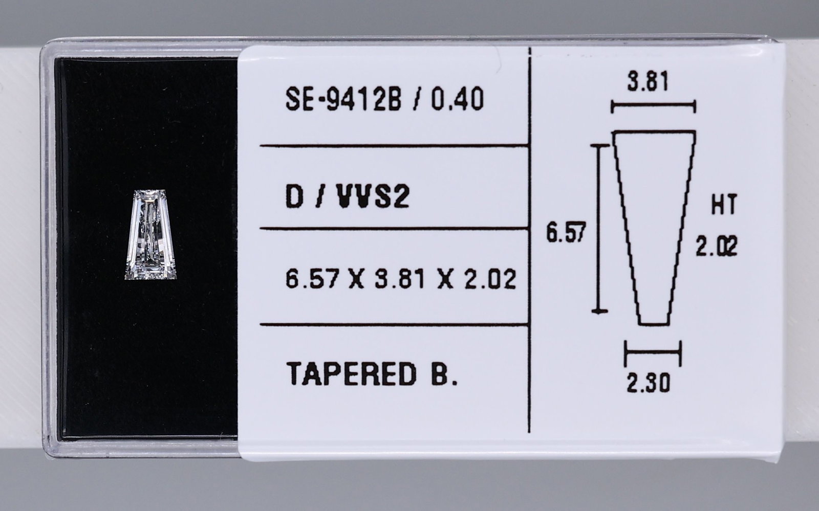 Tapered Baguette 0.4ct D VVS2 - Loose Natural Diamond: Tapered Baguette 0.4ct D VVS2 - Loose Natural Diamond 0.4ct D VVS2 - Loose Natural Diamond Tapered Baguette. This loose natural diamond features exceptional clarity, color, and polish, with a high lev