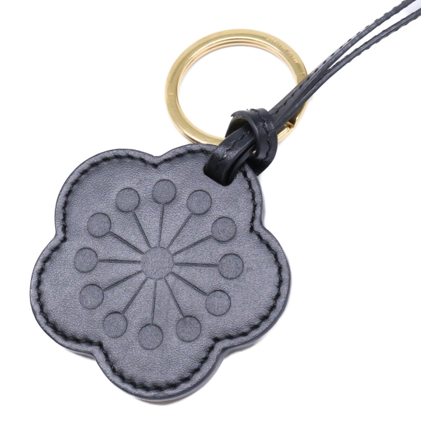 Celine Handbag Charm Leather: Celine Handbag Charm Leather Black Calfskin Leather Handbag Charm from Celine. Made from high-quality leather, this charm features a sleek and sophisticated design. A stylish addition to any handbag