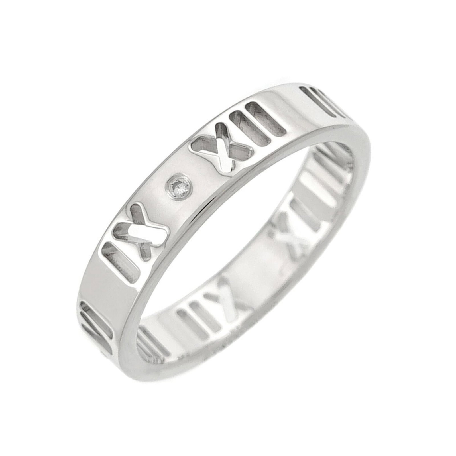 Tiffany Band Ring White Gold (18K): Tiffany Band Ring White Gold (18K) Tiffany Band Ring White Gold (18K) features a classic band ring design in white gold, crafted with 18K material. This women's ring boasts a timeless elegance and