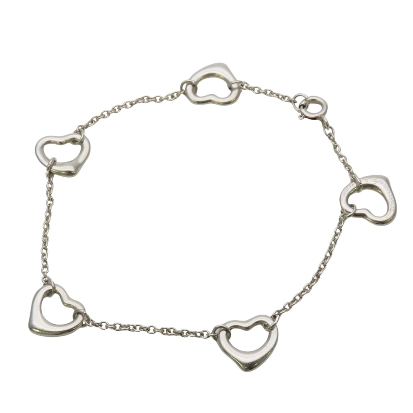 Tiffany Charm Bracelet Silver 925: Tiffany Charm Bracelet Silver 925 Silver 925 Tiffany Charm Bracelet, 18cm in length. This charm bracelet features the iconic Tiffany brand and is made from high-quality silver. Its sleek design makes 