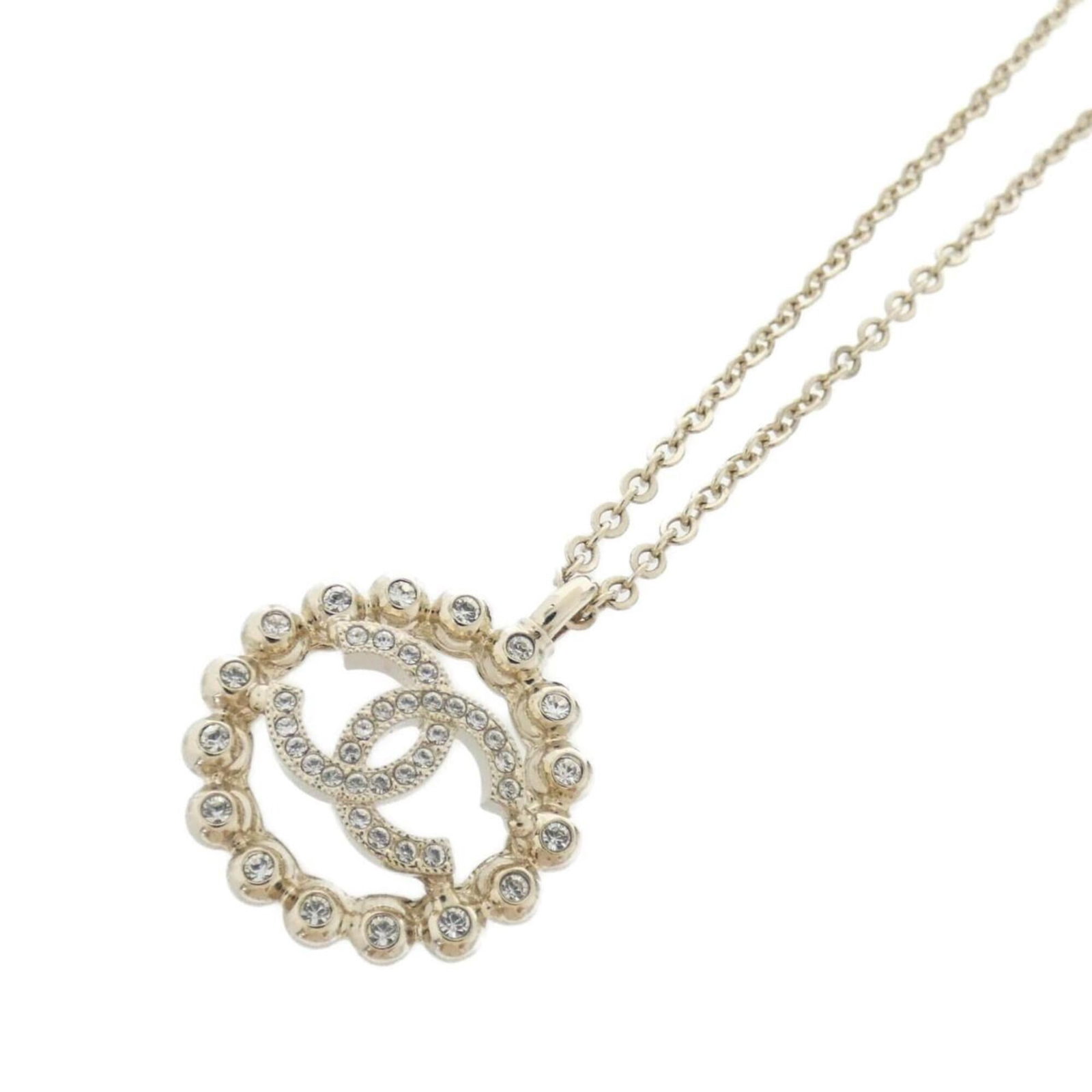 Abf458 Necklace by Chanel: Abf458 Necklace by Chanel The Abf458 Necklace by Chanel boasts a sleek design with a clear, gold pendant measuring 25mm x 25mm. This elegant necklace features a versatile neck circumference range of