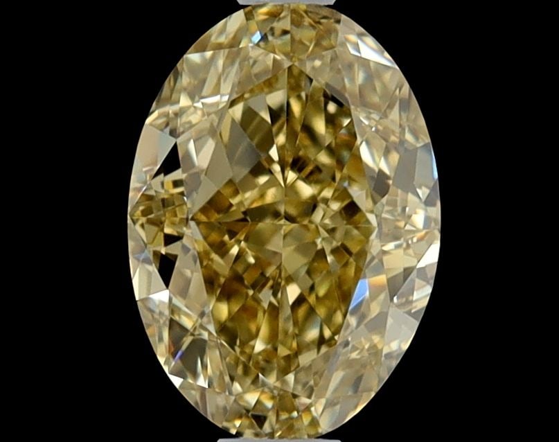 GIA Oval 0.82ct Fancy Brownish Yellow VVS2 - Loose Natural Diamond: GIA Oval 0.82ct Fancy Brownish Yellow VVS2 - Loose Natural Diamond GIA Oval 0.82ct Fancy Brownish Yellow VVS2 - Loose Natural Diamond.This loose natural diamond boasts an impressive oval cut, measurin