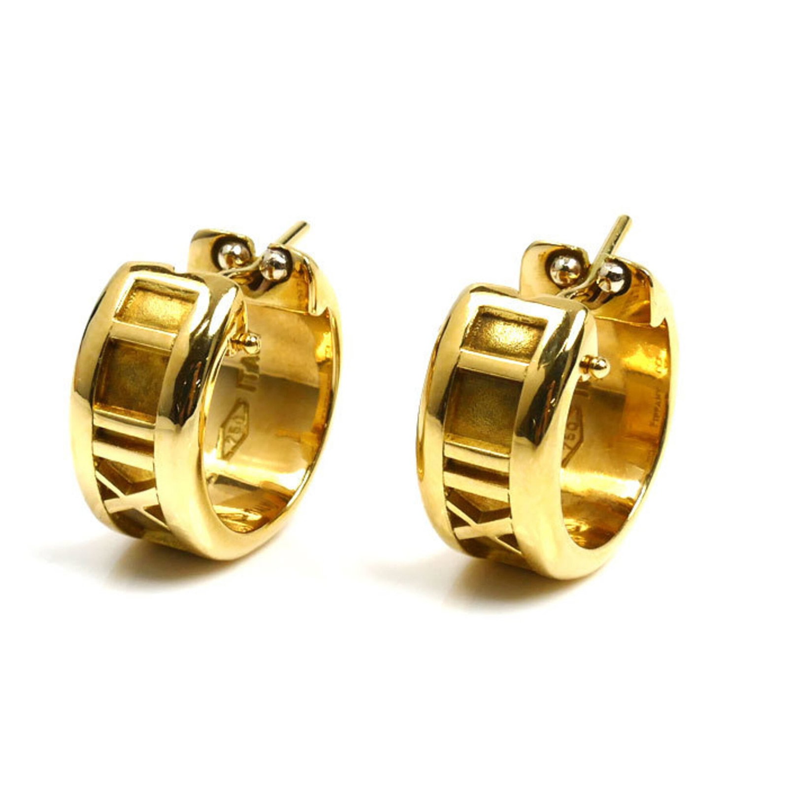 Tiffany Hoop Earrings Yellow Gold (18K): Tiffany Hoop Earrings Yellow Gold (18K) Yellow gold (18K) hoop earrings from Tiffany, crafted with precision and attention to detail. Measuring 14.40mm in diameter, these elegant earrings feature a sl