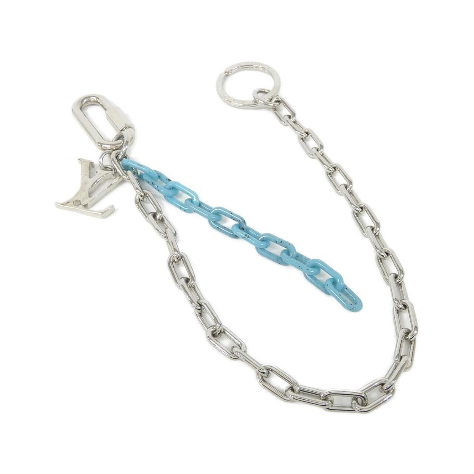 Louis Vuitton Handbag Charm: Louis Vuitton Handbag Charm Turquoise Louis Vuitton Handbag Charm. Made by the renowned French fashion brand, this charm showcases the iconic style of Louis Vuitton. Featuring a striking turquoise col
