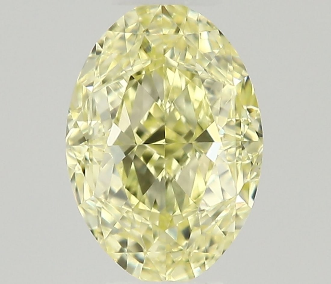 Oval 0.3ct Fancy Light Yellow VVS2 - Loose Natural Diamond: Oval 0.3ct Fancy Light Yellow VVS2 - Loose Natural Diamond Oval cut diamond with a vibrant Fancy Light Yellow color, measuring 4.89L x 3.41W x 2.33H. Certified VVS2 clarity and VG polish provide excep