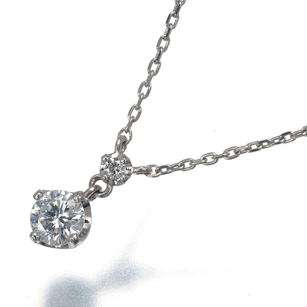 Vendome Necklace Diamond 0.16Ct 950 850 Platinum: Vendome Necklace Diamond 0.16Ct 950 850 Platinum Platinum pendant necklace featuring a natural diamond with a diameter of approximately 3.4mm, set in a 950/850 platinum design. The centre stone weighs