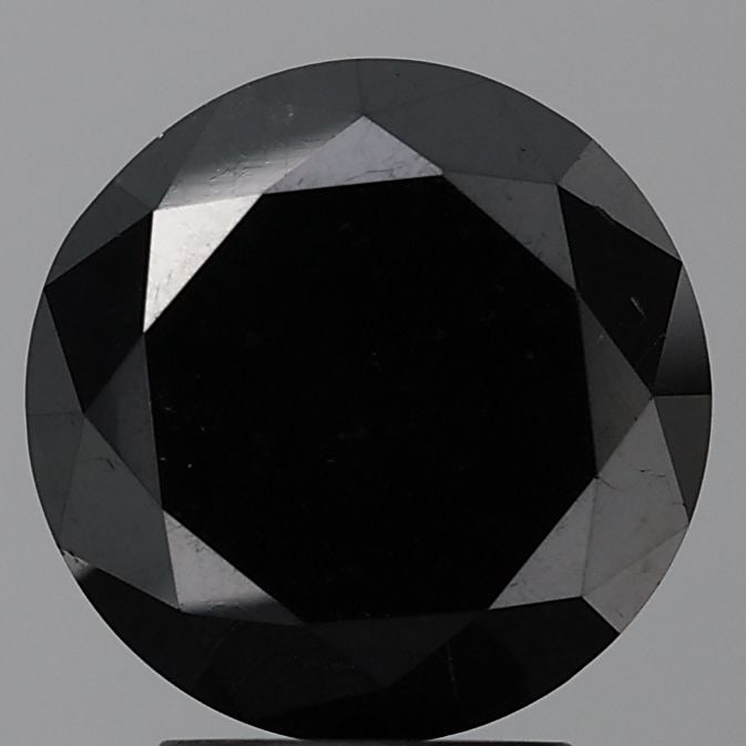 Round 1.25ct Black VVS2 - Loose Natural Diamond: Round 1.25ct Black VVS2 - Loose Natural Diamond 1.25ct Round Black Diamond with Exceptional Clarity and Polish, Measuring 6.6L X 6.6W X 4.38H. This natural Fancy diamond boasts a VVS2 clarity grade an