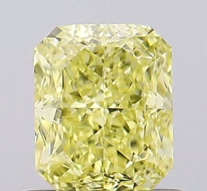 GIA Radiant 0.71ct Fancy Intense Yellow VVS1 - Loose Natural Diamond: GIA Radiant 0.71ct Fancy Intense Yellow VVS1 - Loose Natural Diamond GIA certified Fancy Intense Yellow diamond with exceptional clarity and polish, boasting vibrant yellow hue. Measuring 5.32L x