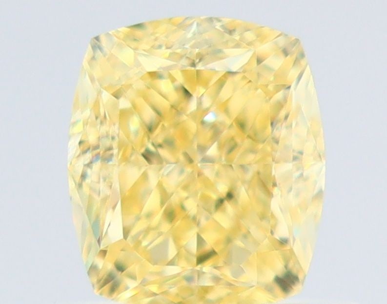 GIA Cushion Brilliant 0.75ct Fancy Yellow VVS1 - Loose Natural Diamond: GIA Cushion Brilliant 0.75ct Fancy Yellow VVS1 - Loose Natural Diamond GIA certified, this loose natural Fancy Yellow VVS1 diamond boasts an exceptional cut and clarity. Measuring 5.38L x 4.62W x
