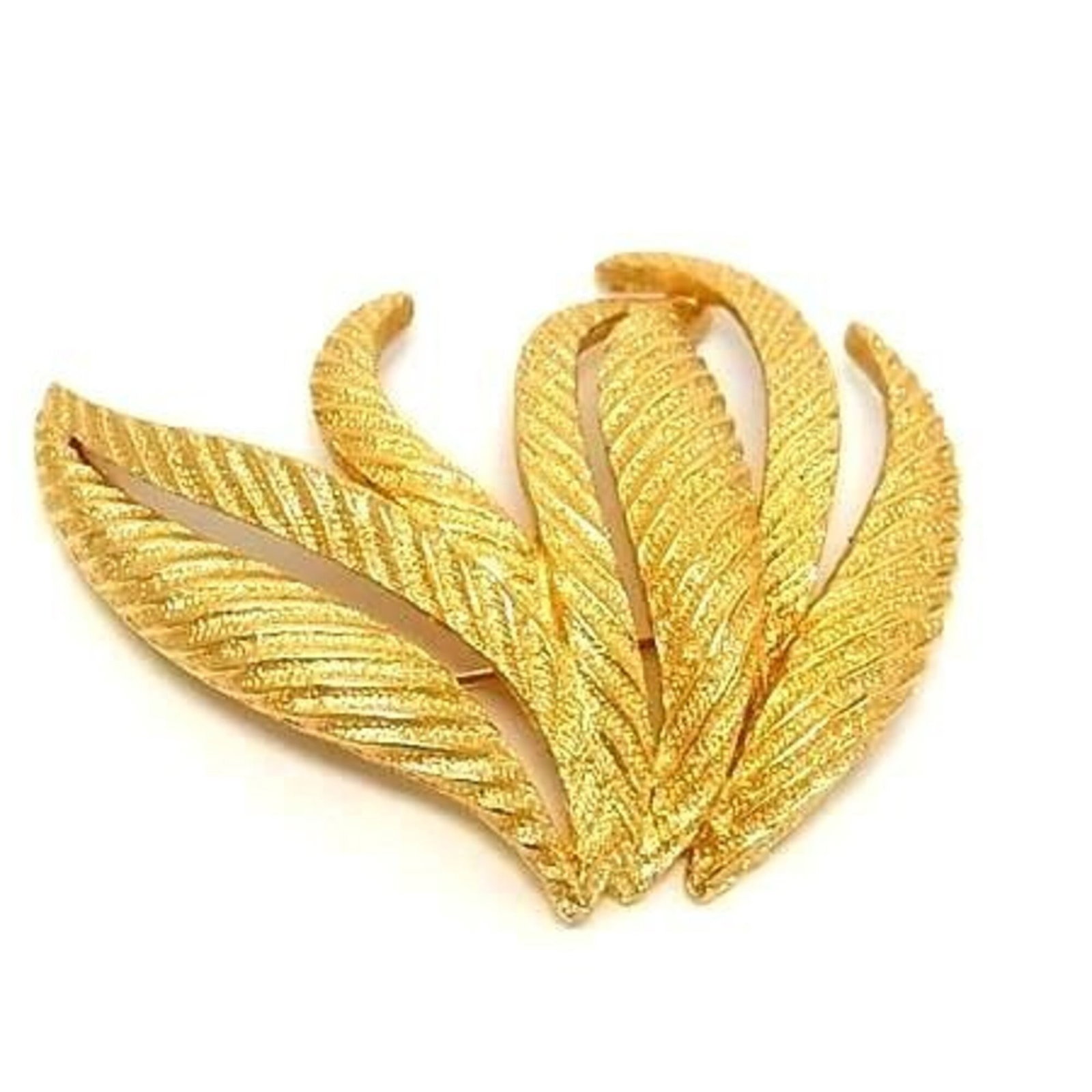 Christian Dior Brooch: Christian Dior Brooch Gold Christian Dior Brooch. This gold brooch from the renowned fashion house features a striking design, measuring 5.5cm x 4.8cm in size. The intricate details and luxurious
