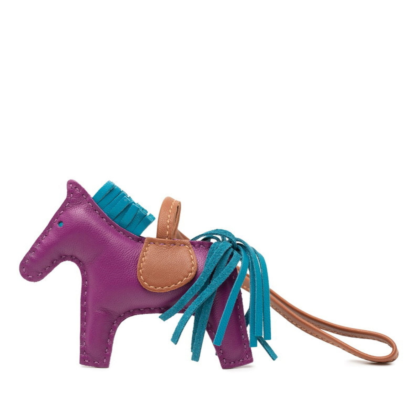 Hermes Charm Handbag Agneau Milo: Hermes Charm Handbag Agneau Milo Agneau Milo, a vibrant blue and purple handbag charm from Hermes, boasts an intricate design. Measuring just 9.00mm x 7.50mm / 0.35'' x 0.30'', this compact charm is