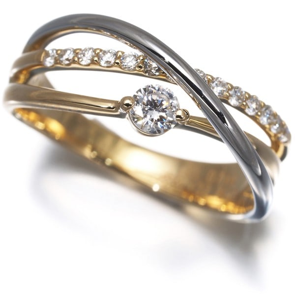 Diamond 0.137Ct/ 0.15Ct Bicolor Ring 18K 750 Yellow Gold/ 900 Platinum: Diamond 0.137Ct/ 0.15Ct Bicolor Ring 18K 750 Yellow Gold/ 900 Platinum This striking 18K yellow gold and platinum bicolor ring showcases two beautiful diamonds, one at the center with a diameter of ap