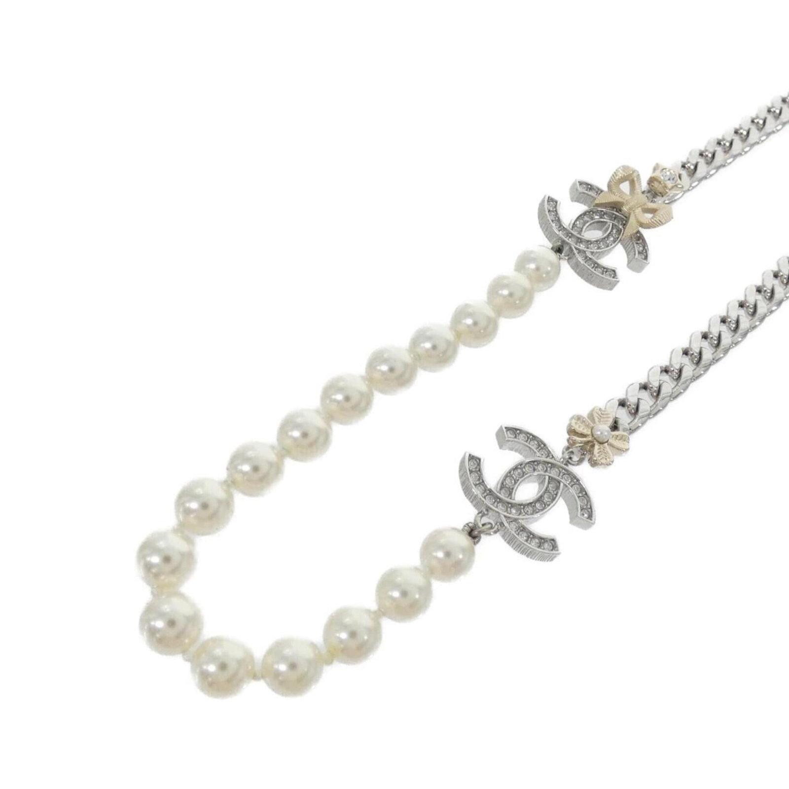 Chanel Necklace: Chanel Necklace Gold, Silver, and White Pearl Necklace from Chanel. This elegant necklace boasts a 16mm x 22mm pendant made from artificial pearl, suspended from a gold chain that fits necks with a ci